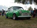 Green Mini Cooper with wide Fender flares